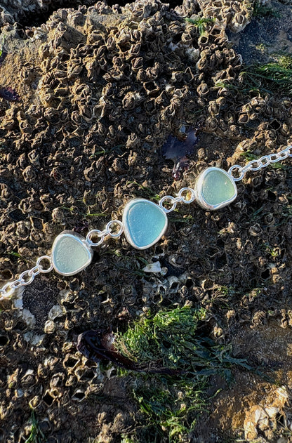 sterling silver bracelet with three pieces of seaglass 
